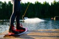 men s feet on a wakeboard Royalty Free Stock Photo