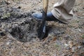 Men's foot on a shovel, dig a hole. Royalty Free Stock Photo