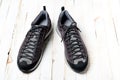 Men`s gray-brown sports shoes laced with laces. Close-up shot Royalty Free Stock Photo