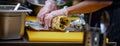 Men`s hands wrapping traditional shawarma wrap with chicken and vegetables Royalty Free Stock Photo