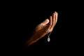 Men`s hands in prayer on a black background. The concept of faith, prayer, mourning, forgiveness, confession Royalty Free Stock Photo