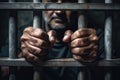 Men\'s hands rest on the bars of a prison cell. Generative AI Royalty Free Stock Photo