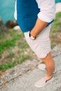 Men`s hands with a watch. Hands of the groom. Wedding at the sea Royalty Free Stock Photo