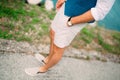 Men`s hands with a watch. Hands of the groom. Wedding at the sea Royalty Free Stock Photo