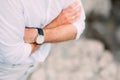 Men`s hands with a watch. Hands of the groom. Wedding at the sea Royalty Free Stock Photo