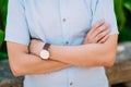 Men`s hands with a watch. Hands of the groom. Wedding at the sea Royalty Free Stock Photo