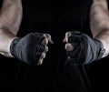 Men`s hands wrapped in a black bandage Royalty Free Stock Photo