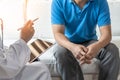 Men`s health exam with doctor or psychiatrist working with patient having consultation on diagnostic examination on male disease Royalty Free Stock Photo