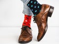 Men`s legs in bright, colorful socks and stylish shoes Royalty Free Stock Photo