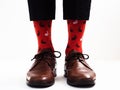 Men`s legs in bright, funny socks Royalty Free Stock Photo