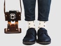 Men`s legs, bright socks and stylish shoes