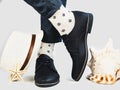 Men`s legs, bright socks and stylish shoes