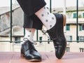 Men`s legs, stylish shoes and colorful socks Royalty Free Stock Photo