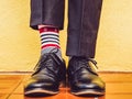 Men`s legs, stylish shoes and colorful socks Royalty Free Stock Photo