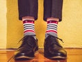 Men`s legs, stylish shoes and colorful socks Royalty Free Stock Photo