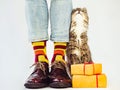 Men`s legs, stylish shoes, colorful socks with a pattern Royalty Free Stock Photo