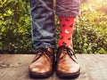 Men`s legs in stylish shoes and funny socks Royalty Free Stock Photo