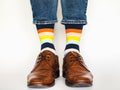 Men`s legs, trendy shoes and bright socks Royalty Free Stock Photo