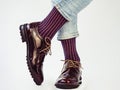 Men`s legs, trendy shoes and bright socks Royalty Free Stock Photo