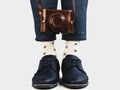 Men`s legs, vintage camera, socks and stylish shoes Royalty Free Stock Photo