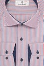 Men`s shirt in packing close-up macro top view