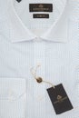 Men`s shirt in packing close-up macro top view
