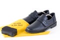 Men's shoes with a sponge Royalty Free Stock Photo