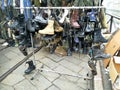 Men`s shoes at a vintage market: amphibians, boots, ankle boots, sneakers