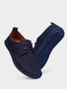 Men`s suede blue summer shoes with perforation and elastic black sole.
