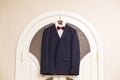 Men`s suit hanging on trempel