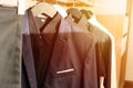 Men`s suit jackets in a clothing room