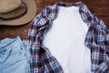 Men T-shirt mockup with plaid shirt and hat Royalty Free Stock Photo