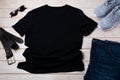 MenÃ¢â¬â¢s T-shirt mockup with running shoes and leather belt