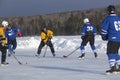 Men`s teams compete in a Pond Hockey Festival in Rangeley. Royalty Free Stock Photo