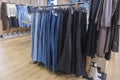 men's trousers on hangers in the store Royalty Free Stock Photo