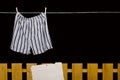 Men's underwear hanging on a clothesline