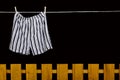 Men's underwear hanging on a clothesline