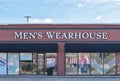 Men\'s Wearhouse business storefront exterior in Houston, TX.