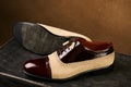 Men`s wedding shoes on a dark wooden box, close-up Royalty Free Stock Photo