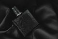 wet perfume on a black background. Men\'s Day Royalty Free Stock Photo