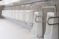 Men`s white urinals design, Close up row of outdoor urinals men public toilet Royalty Free Stock Photo