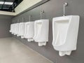 Men`s white urinals design, Close up row of outdoor urinals men public toilet Royalty Free Stock Photo