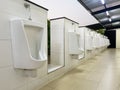 Men`s white urinals design, Close up row of outdoor urinals men public toilet Royalty Free Stock Photo
