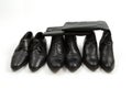 Men`s and women`s black shoes isolated, white background Royalty Free Stock Photo