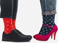 Men`s and women`s trendy shoes, bright socks Royalty Free Stock Photo