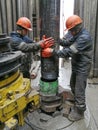 Men`s work while drilling oil and gas wells.