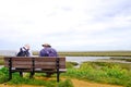 Men on bench.