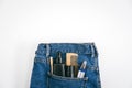 Men self care beauty kit, male beauty care cosmetic products and devices in blue jeans denim pocket. Man self care set Royalty Free Stock Photo