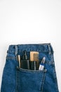 Men self care beauty kit, male beauty care cosmetic products and devices in blue jeans denim pocket. Man self care set Royalty Free Stock Photo