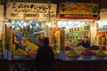 Men selling olives in souk market